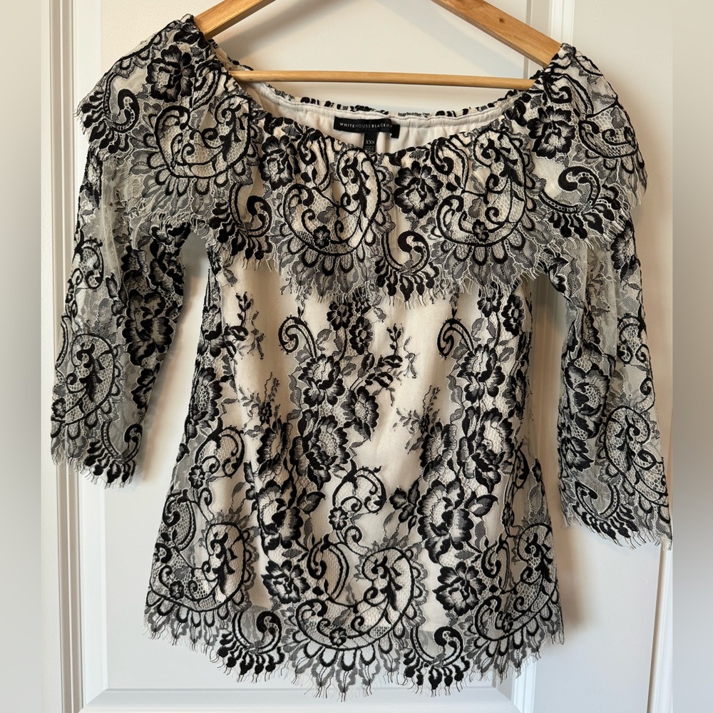 White House Black Market Cream and Black lace off the shoulder blouse. Size XXS